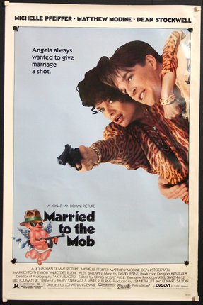 a movie poster of a man carrying a woman on his back