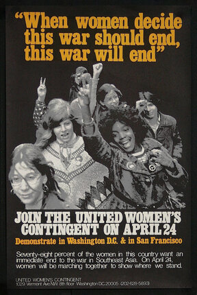 a group of women with peace signs