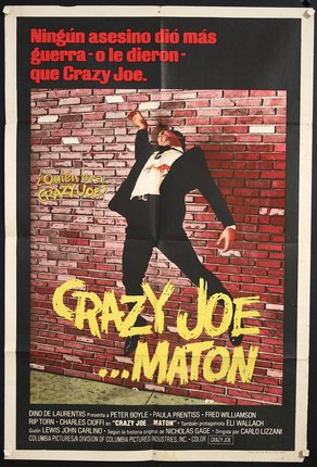 a poster of a man on a brick wall with Grand Guignol in the background