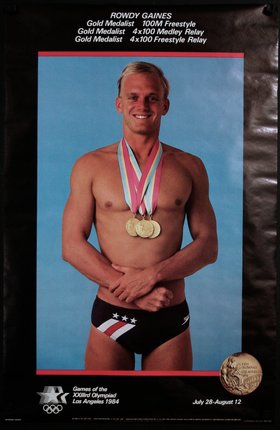 a man wearing a swimsuit with medals