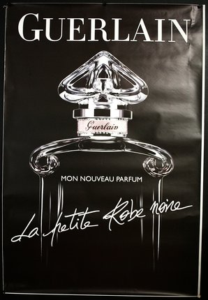 a poster of a perfume bottle with Jack Daniel's in the background