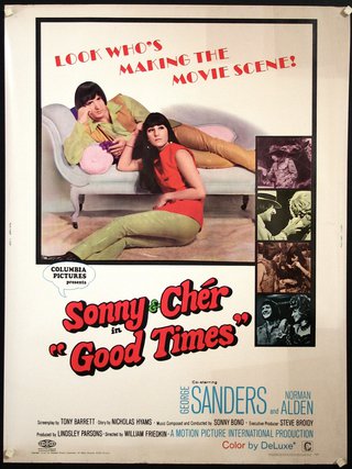 a movie poster of two women lying on a couch