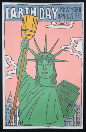 a green statue of liberty holding a broom
