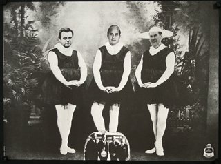 a group of men in black dresses
