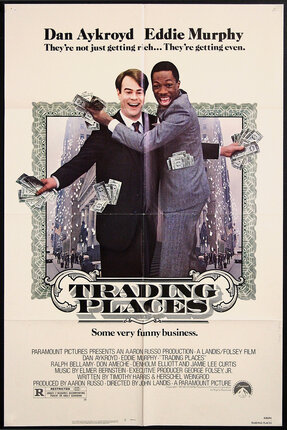a movie poster of two men holding money