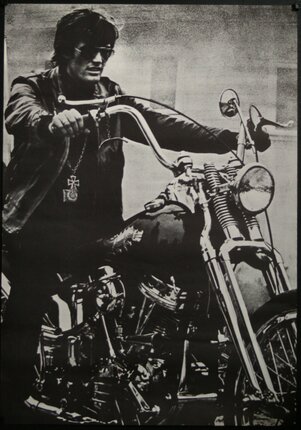 a man on a motorcycle