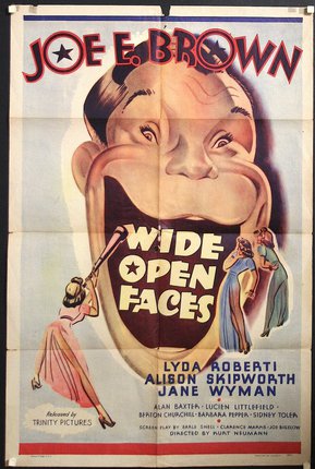 a movie poster with a man's mouth and a woman standing next to it