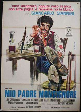 a poster of a man sitting at a table