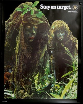 a poster of two men in camouflage