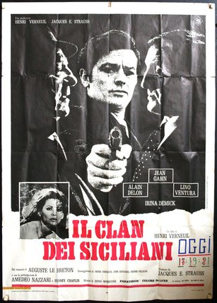 a movie poster with a man pointing a gun