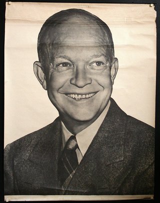a man in a suit smiling