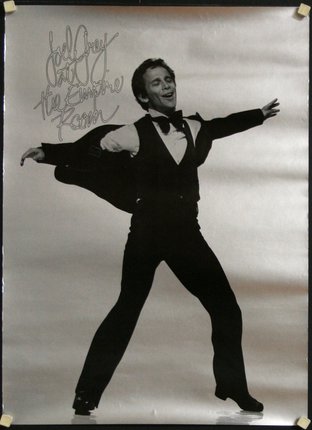 a man in a tuxedo dancing