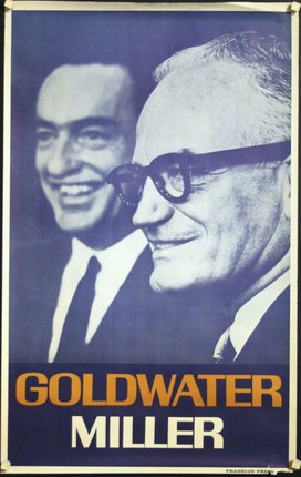 a man in glasses smiling next to another man in glasses