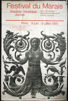 a poster with a statue of a woman