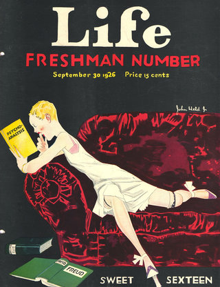 a magazine cover of a woman reading a book