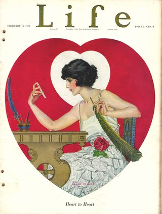 a magazine cover with a woman holding a feather