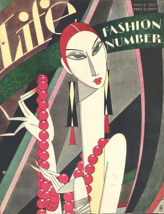 a magazine cover of a woman holding a necklace