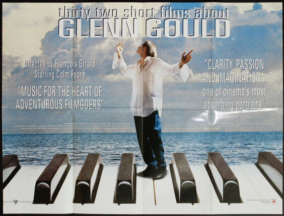 a poster of a man standing on a piano keyboard