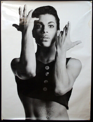 a woman holding her hands up