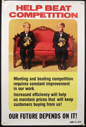 a poster of two boys sitting on a red couch