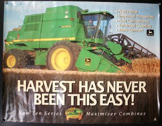 a poster of a green tractor