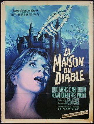 a movie poster of a woman and a castle