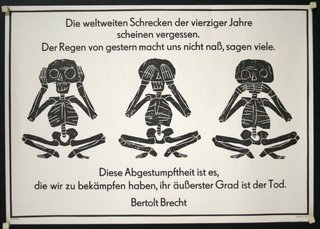a black and white sign with three skeletons