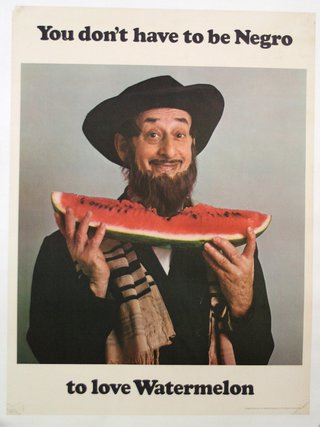 a man holding a slice of watermelon