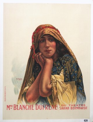 a woman with a headdress and scarf