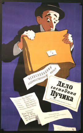 a man holding a yellow box