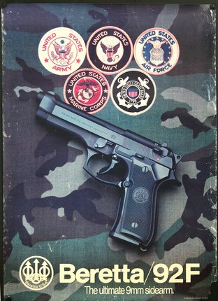 a gun on a camouflage background