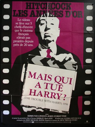 a movie poster with a man holding a clapper board