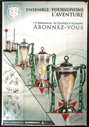 a poster with trophies and a green ribbon