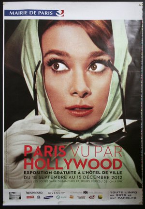 a poster of a woman with glasses