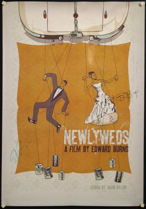 a poster with a man and woman on strings