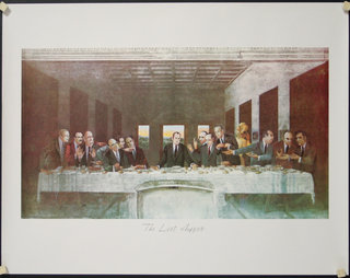 a group of men sitting at a long table