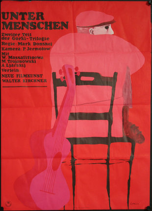 a poster of a man sitting in a chair with a guitar