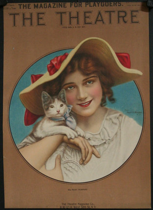 a woman holding a cat