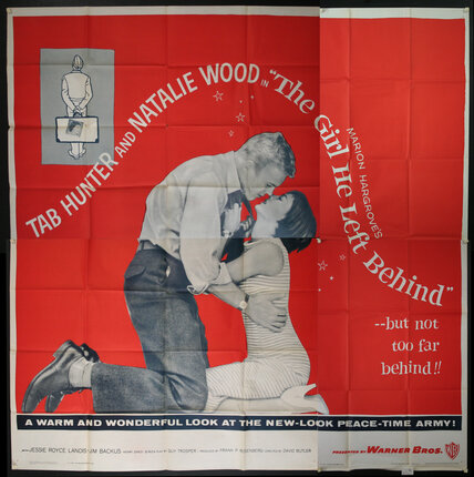 a poster of a man and woman kissing