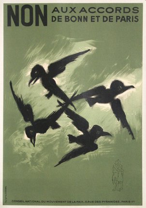 a group of birds flying in the sky