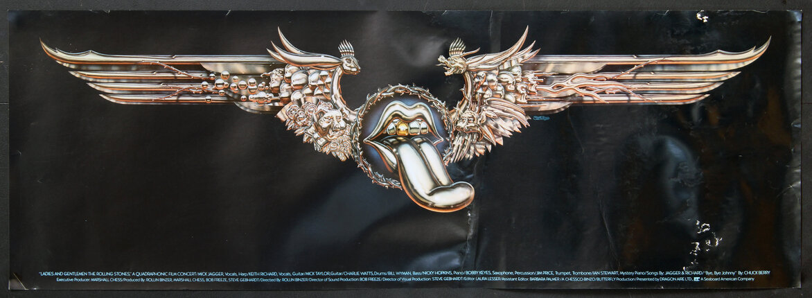 a poster with a gold tongue and wings