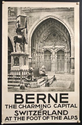 a poster of a building with a statue of a man on a horse