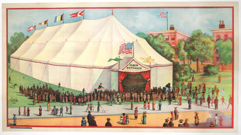 a large white tent with people in front of it