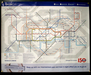 a map of a subway system with London Underground in the background