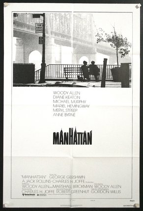 a movie poster of a man and woman sitting on a bench