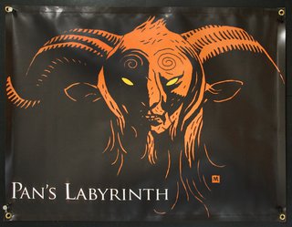 a black and orange sign with a goat head and horns