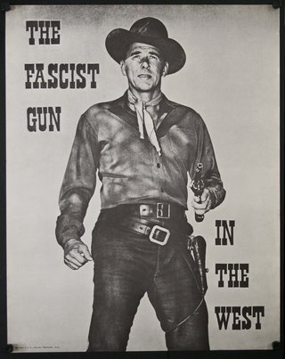 a man in a cowboy hat holding a gun