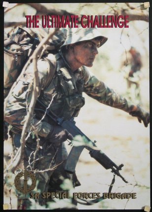 a man in camouflage holding a gun