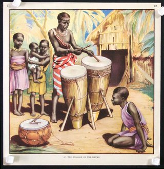 a man playing drums with children