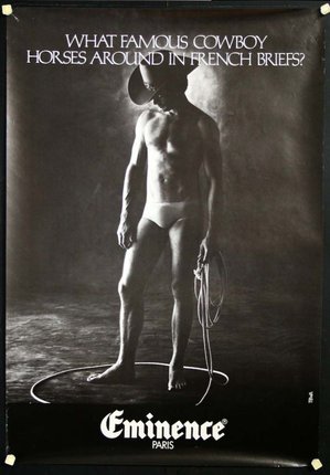 a man in underwear holding a rope